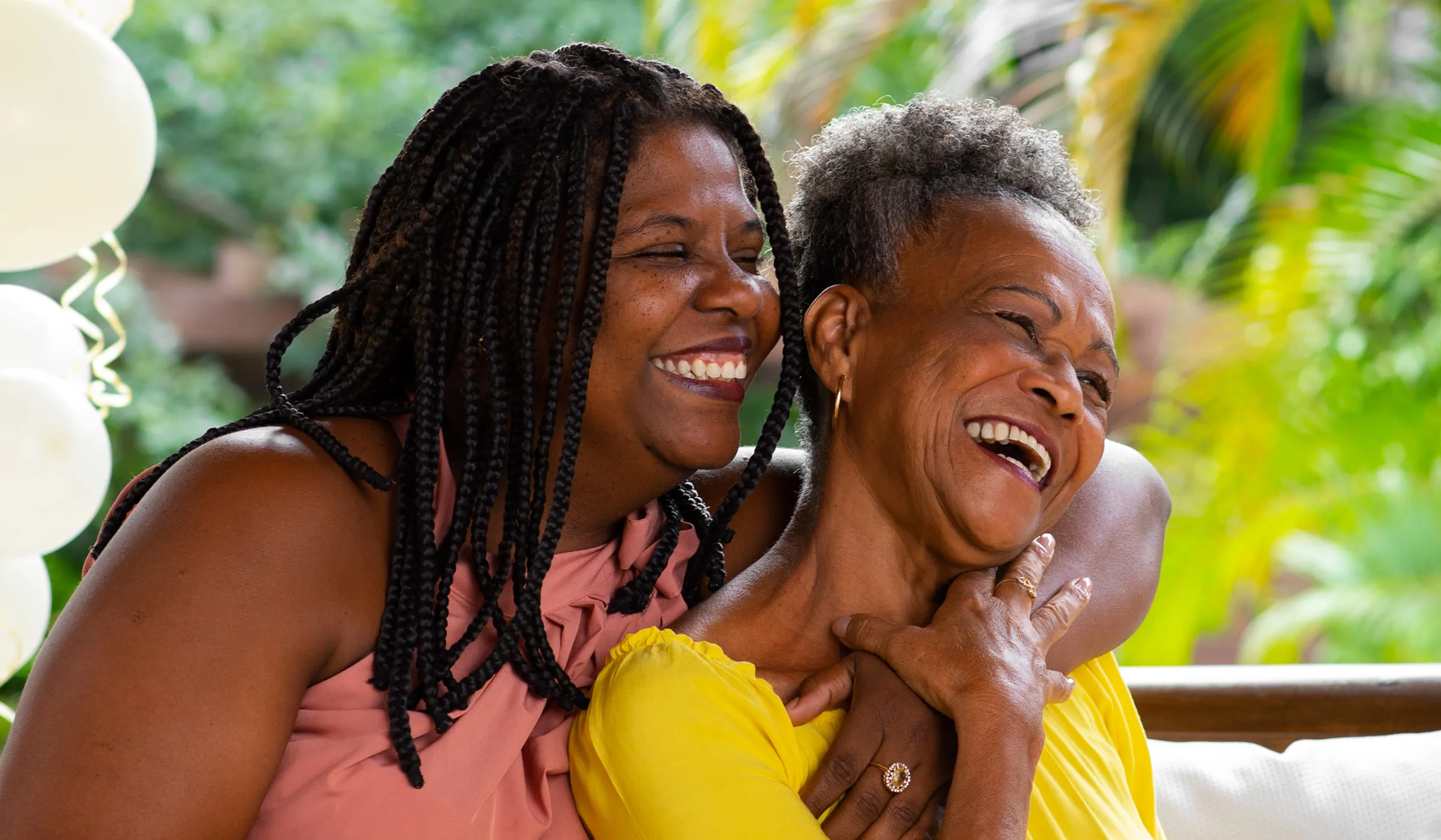 Mother and daughter hugging each other