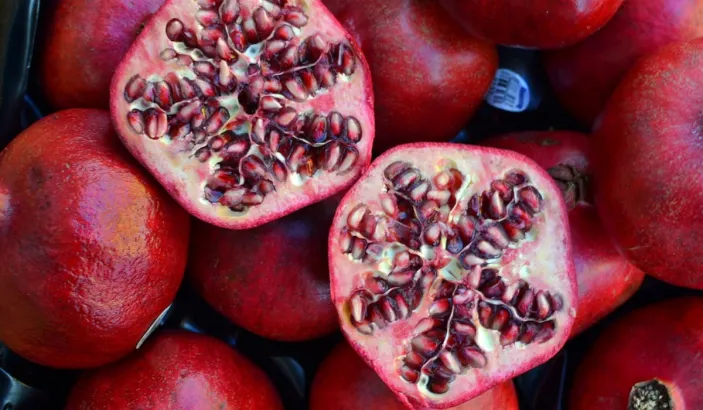 Open pomegranate with seeds